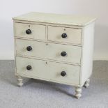 A 19th century white painted pine chest,