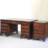 A reproduction pedestal desk, with a green inset top, on bracket feet, 152cm,