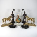 A pair of brass horse door stops, 23cm high,