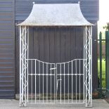 A bespoke made wrought iron garden gazebo,