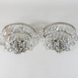 A pair of Swarovski style crystal wall lights,