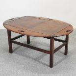 A George III style mahogany butler's tray, on stand,