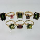 A 9 carat gold tourmaline single stone dress ring, stone approximately 7 x 5mm, on a textured band,