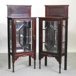 A pair of early Edwardian astragal glazed display cabinets, with mirrored backs,