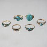 A collection of six unmarked turquoise set dress rings, sizes L/M, 14.