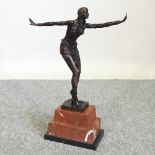 An Art Deco style bronze figure of a lady, on a marble base,