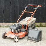 A Sabo petrol rotary lawn mower