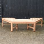 A teak shaped half tree garden bench,