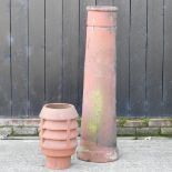 A terracotta chimney pot, 123cm high,
