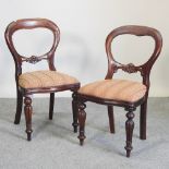 A set of six Victorian style balloon back dining chairs