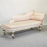 A 19th century cream and gilt painted pink upholstered chaise longue,