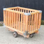 An early 20th century French wooden trolley,