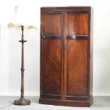A 1930's bow front double wardrobe, 100cm,