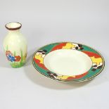 A Clarice Cliff Honey Glaze soup plate, 20cm diameter, together with a Clarice Cliff style vase,