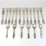 A collection of George III silver fiddle pattern table forks, various dates and makers,