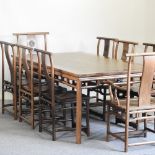 A 20th century Chinese dining table, 215 x 115cm, together with eight chairs,