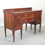 An early 20th century mahogany and inlaid sideboard,