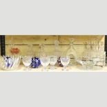 A collection of glass, to include a tantalus, modern coloured glass witches balls,