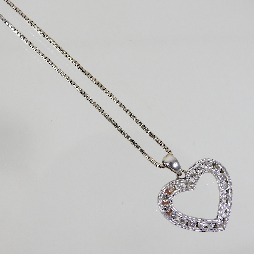 A 14 carat gold and diamond heart shaped pendant, 2cm wide, on a fine chain, 6. - Image 7 of 7