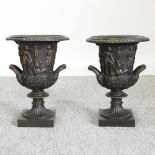 A pair of modern bronze campana shape urns, relief decorated with figures,