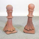 A pair of Victorian style terracotta gable end roof finials,