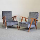 A pair of Art Deco style blue upholstered armchairs