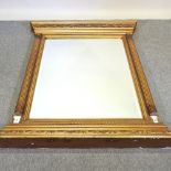 A large gilt framed over mantel mirror,
