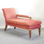 A Victorian red upholstered chaise longue,
