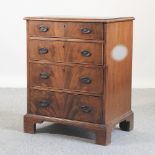 A 19th century mahogany chest, containing four drawers,