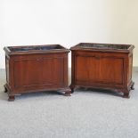 A pair of reproduction mahogany planters, each with a metal liner,