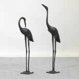 A bronzed model of a heron, 60cm,