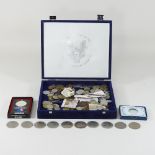 A collection of coins, to include a silver proof 1984 Olympic dollar,