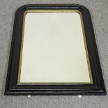 A black and gilt painted framed wall mirror,