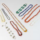 A collection of jewellery, to include bead necklaces,