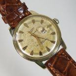 A 1960's Longines Conquest Calendar gold plated automatic gentleman's wristwatch,