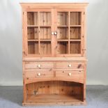An antique style pine glazed dresser,