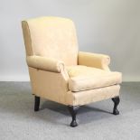 A Wesley Barrell Marlborough gold damask wing armchair,