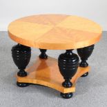 An Art Deco continental Biedermeier style maple and ebonised occasional table,