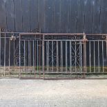 A pair of wrought iron garden gates, each 130cm, with hinges,