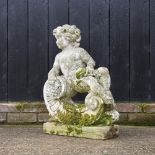 A reconstituted stone garden figure of cherub,