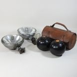 A pair of vintage chrome Jaguar spotlights, together with a vintage bowls set,