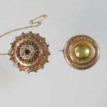 A Victorian 9 carat gold circular brooch, 3cm diameter, together with another smaller, 11.