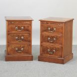 A pair of bespoke made walnut bedside chests,