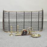 A brass mounted fire screen, 117cm, together with a pair of mechanical bellows,
