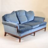 A 1920's blue upholstered three piece suite, comprising a sofa, 189cm,