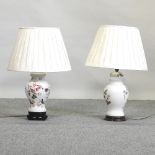 A porcelain table lamp and shade decorated with birds and flowers, 64cm high overall,