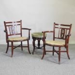 A pair of Edwardian inlaid elbow chairs,