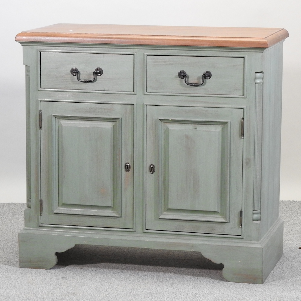 A modern green painted pine cabinet, on bracket feet,