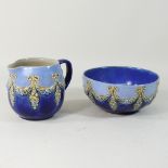 A 1930's Royal Doulton stoneware jug and matching bowl,