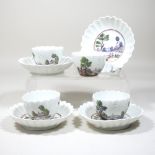 A set of four 18th century porcelain tea bowls and saucers,